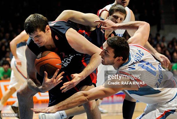 Caja Laboral's Stanko Barac vies with Cibona Zagreb's Vedran Vukusic during a Euroleague basket match, on March 11 at Fernando Buesa Arena in...