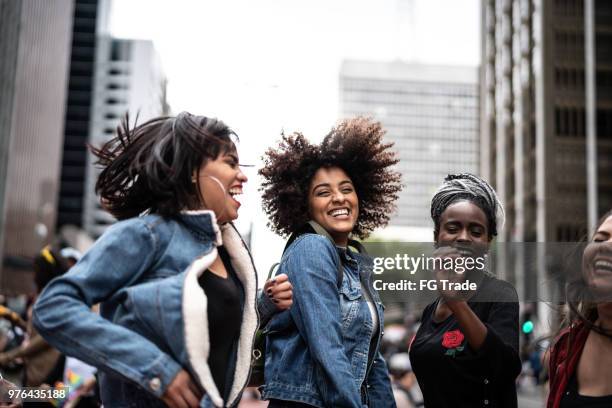 authentic group of diverse friends having fun in the city - avenida paulista stock pictures, royalty-free photos & images