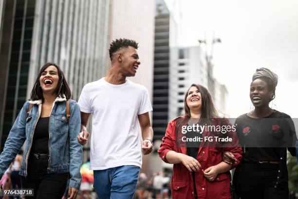 authentic group of diverse friends having fun in the city - avenida paulista imagens e fotografias de stock