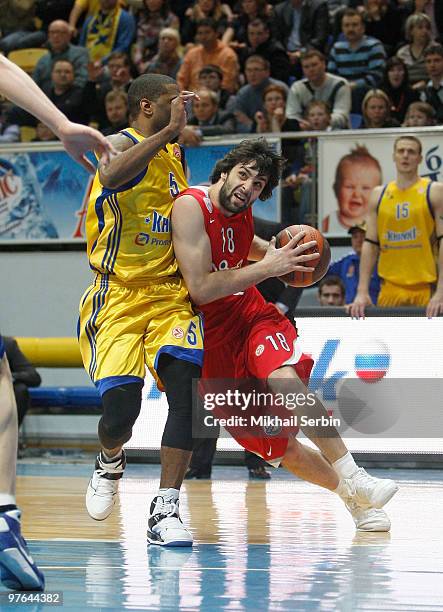 Milos Teodosic, #18 of Olympiacos Piraeus competes with Keith Langford, #5 of BC Khimki Moscow Region in action during the Euroleague Basketball...