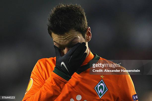 Mesut Oezil of Bremen reacts during the UEFA Europa League round of 16 first leg match between Valencia and SV Werder Bremen at Mestalla Stadium on...