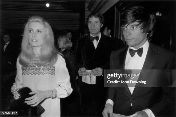 David Bailey with his wife, the French actress Catherine Deneuve at the premiere of 'Casino Royale'.