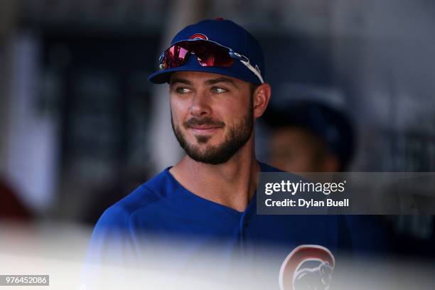 Kris Bryant of the Chicago Cubs walks through the dugout in the eighth inning against the Milwaukee Brewers at Miller Park on June 13, 2018 in...