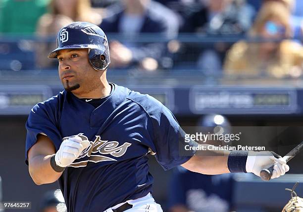 Yorvit Torrealba of the San Diego Padres hits a double against the Chicago Cubs during the third inning of the MLB spring training game at Peoria...