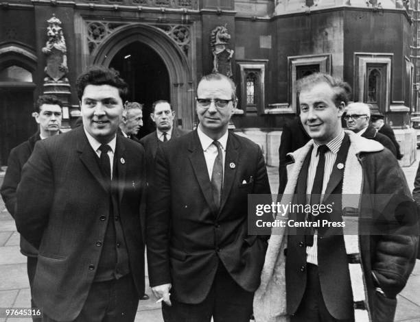 From left to right: John Hume, vice-chairman of the Derry Citizens' Action Committee; Ivan Cooper, chairman of the Derry Citizens' Action Committee;...