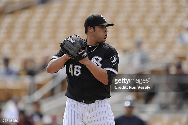 Sergio Santos of the Chicago White Sox pitches during a spring training game against the Seattle Mariners on March 8, 2010 at The Ballpark at...