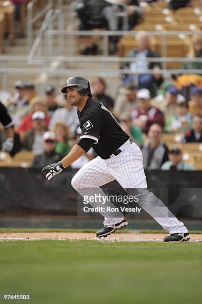 Carlos Quentin of the Chicago White Sox bats during a spring training game against the Seattle Mariners on March 8, 2010 at The Ballpark at Camelback...