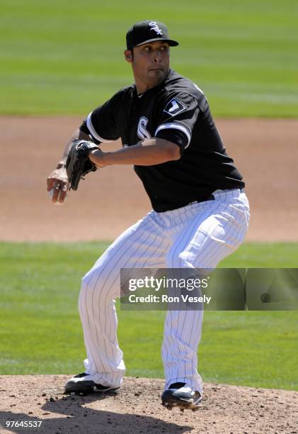 Sergio Santos of the Chicago White Sox pitches against the Cleveland Indians during a spring training game on March 11, 2010 at The Ballpark at...