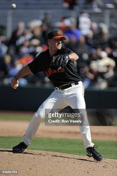 Brian Wilson of the San Francisco Giants pitches during a spring training game against the Chicago White Sox on March 9, 2010 at Scottsdale Stadium,...