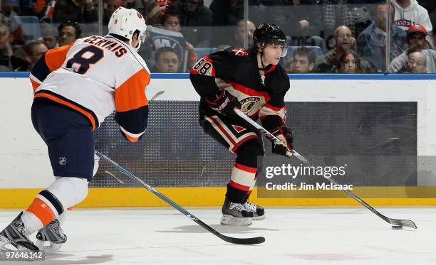 Patrick Kane of the Chicago Blackhawks skates against Bruno Gervais of the New York Islanders on March 2, 2010 at Nassau Coliseum in Uniondale, New...