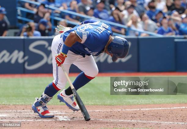 Yangervis Solarte of the Toronto Blue Jays reacts as he pops out to end the ninth inning during MLB game action against the Baltimore Orioles at...