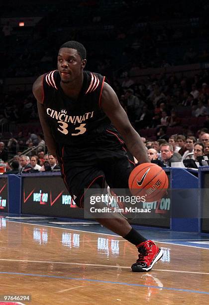 Lance Stephenson of the Cincinnati Bearcats handles the ball against the Louisville Cardinals during the second round of 2010 NCAA Big East...