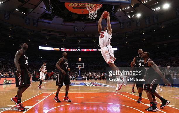 Samardo Samuels of the Louisville Cardinals dunks the ball against the Cincinnati Bearcats during the second round of 2010 NCAA Big East Tournament...