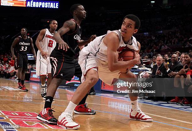 Jared Swopshire of the Louisville Cardinals holds the ball against the Cincinnati Bearcats during the second round of 2010 NCAA Big East Tournament...