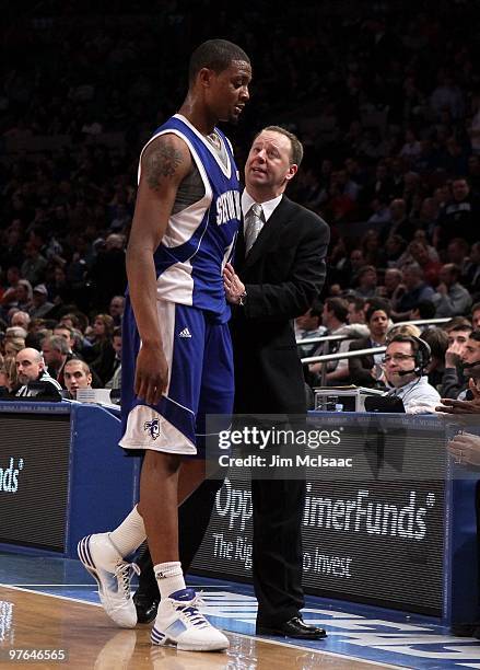 Head coach Bobby Gonzalez reacts with Herb Pope of the Seton Hall Pirates against the Notre Dame Fighting Irish during the second round of 2010 NCAA...