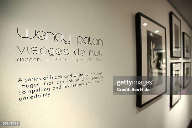 General view inside the opening of Wendy Paton's "Visages De Nuit" at the Sous Les Etoiles Gallery on March 11, 2010 in New York City.