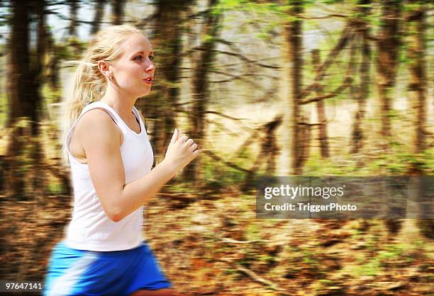 athletic blonde girl running - amateur photography stock pictures, royalty-free photos & images