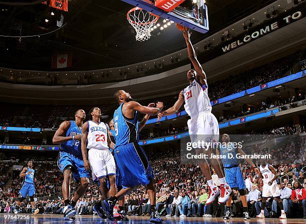 Thaddeus Young of the Philadelphia 76ers shoots a layup against Rashard Lewis of the Orlando Magic during the game at Wachovia Center on March 01,...