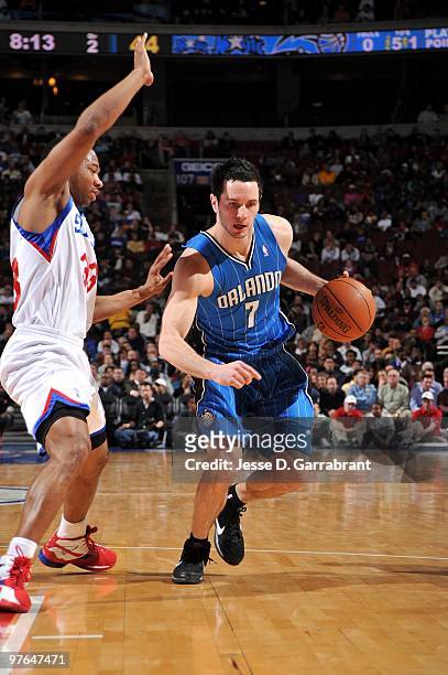 Redick of the Orlando Magic moves the ball up court against Willie Green of the Philadelphia 76ers during the game at Wachovia Center on March 01,...