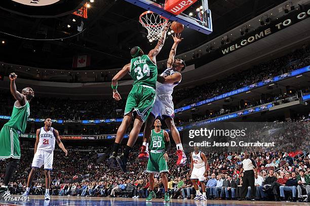 Willie Green of the Philadelphia 76ers shoots a layup against Paul Pierce of the Boston Celtics during the game at Wachovia Center on March 5, 2010...