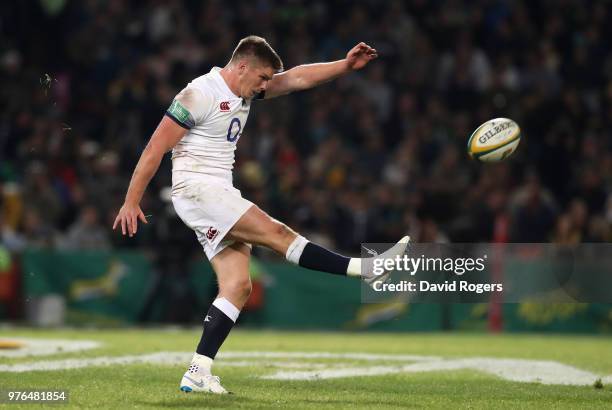 Owen Farrell of England kicks the ball upfield during the second test match between South Africa and England at Toyota Stadium on June 16, 2018 in...