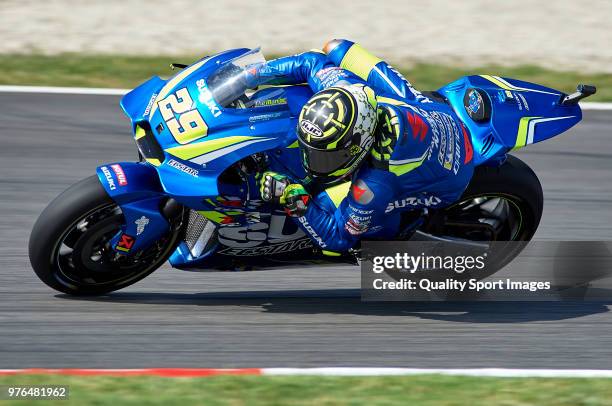 Andrea Iannone of Italy and Team Suzuki Ecstar rounds the bend during free practice for the MotoGP of Catalunya at Circuit de Catalunya on at Circuit...
