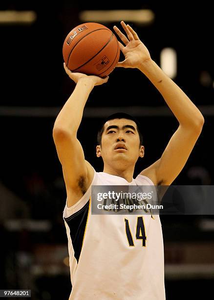 Max Zhang of the California Golden Bears shoots a foul shot against the Oregon Ducks during the quarterfinals of the Pac-10 Basketball Tournament at...