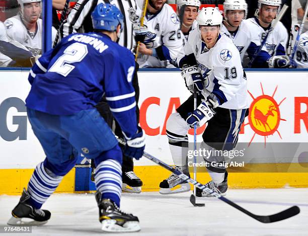 Luke Schenn of the Toronto Maple Leafs defends against Stephane Veilleux of the Tampa Bay Lightning during game action March 11, 2010 at the Air...