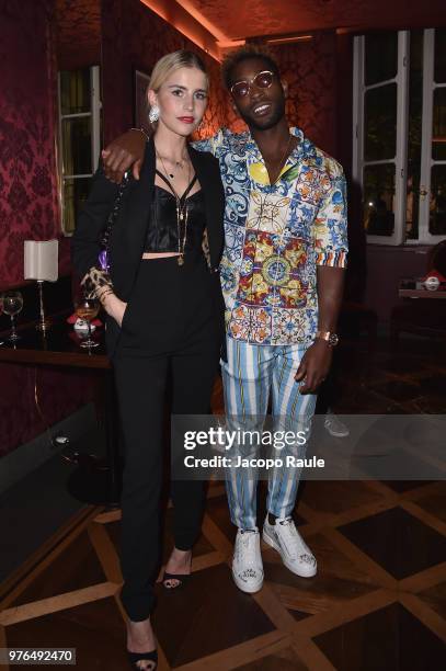 Caro Daur and Tinie Tempah attend Dolce & Gabbana Naked King secret show at Milan Men's Fashion Week Spring/Summer 2019 on June 16, 2018 in Milan,...