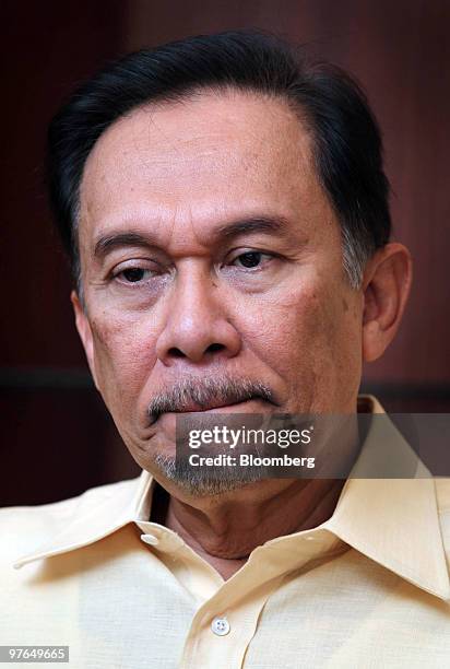 Anwar Ibrahim, Malaysia's opposition leader, pauses during an interview at the headquarters of the National Justice Party in Petaling Jaya, Malaysia,...