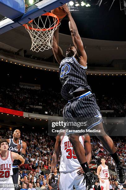 Brandon Bass of the Orlando Magic dunks against the Chicago Bulls during the game on March 11, 2010 at Amway Arena in Orlando, Florida. NOTE TO USER:...