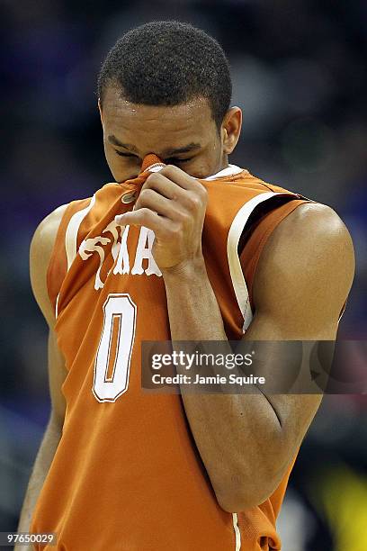 Avery Bradley of the Texas Longhorns wipes his face in the first half while taking on the Baylor Bears during the quarterfinals of the 2010 Phillips...