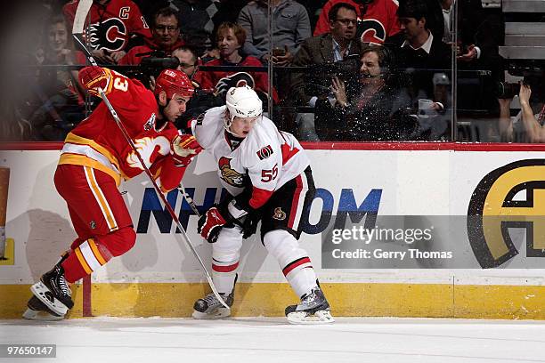 Eric Nystrom of the Calgary Flames skates against Brian Lee of the Ottawa Senators on March 11, 2010 at Pengrowth Saddledome in Calgary, Alberta,...