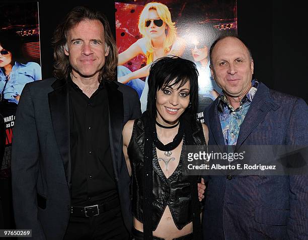 Producer William Pohlad, musician Joan Jett, and CEO of Apparition Bob Berney arrive at the premiere of Apparition's "The Runaways" held at ArcLight...