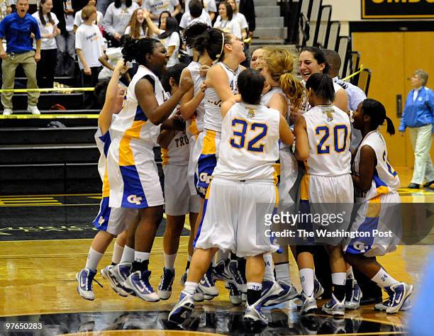 Members of the Gaitherburg team celebrated the overtime victory over Wise 46-44 at UMBC's RAC Arena on March 11, 2010 in Catonsville, Md. 9 OF 10...