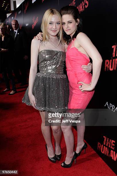 Actresses Dakota Fanning and Kristen Stewart arrive at the Los Angeles Premiere of The Runaways presented by Apparition and KLIPSCH at ArcLight...