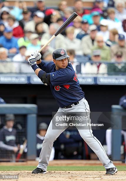 Jhonny Peralta of the Cleveland Indians bats against the Seattle Mariners during the MLB spring training game at Peoria Stadium on March 9, 2010 in...