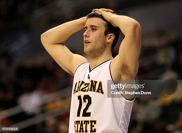 Derek Glasser of the Arizona State Sun Devils reacts late in the game with the Stanford Cardinal during the quarterfinals of the Pac-10 Basketball...