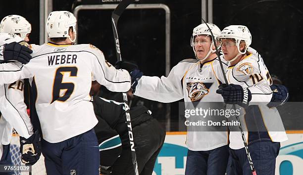 Martin Erat of the Nashville Predators celebrates a goal with teammates Shea Weber and Ryan Suter during an NHL game against the San Jose Sharks on...