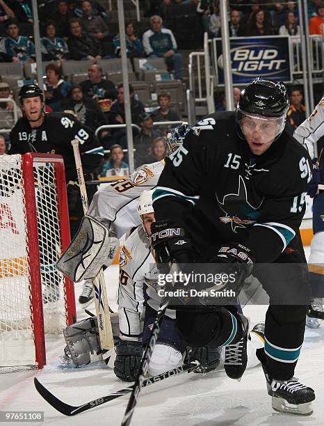 Dan Ellis and Steve Sullivan of the Nashville Predators try to keep up with Dany Heatley of the San Jose Sharks while his teammate Joe Thornton looks...