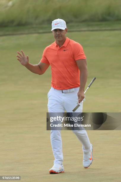 Brooks Koepka of the United States reacts on the 14th green during the third round of the 2018 U.S. Open at Shinnecock Hills Golf Club on June 16,...