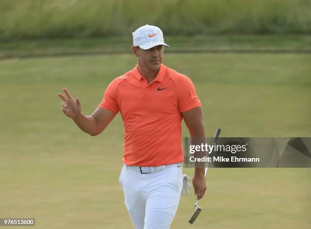 Brooks Koepka of the United States reacts on the 14th green during the third round of the 2018 U.S. Open at Shinnecock Hills Golf Club on June 16,...