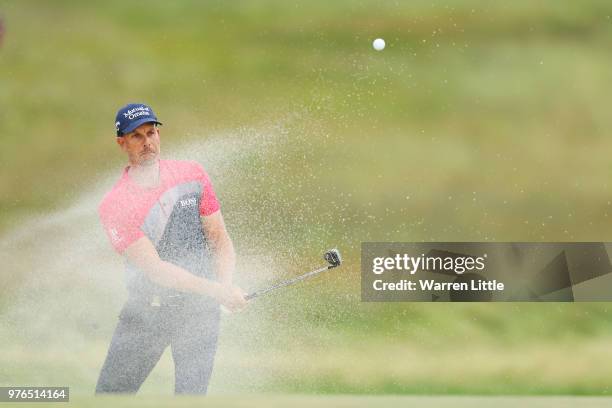 Henrik Stenson of Sweden plays a shot from a bunker on the 15th hole during the third round of the 2018 U.S. Open at Shinnecock Hills Golf Club on...