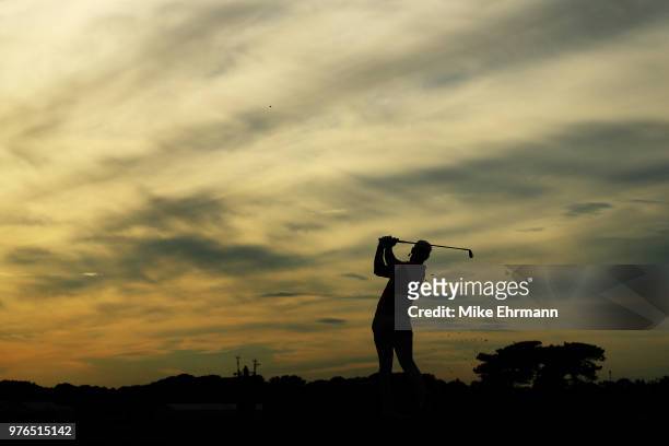 Brooks Koepka of the United States plays his shot from the 17th tee during the third round of the 2018 U.S. Open at Shinnecock Hills Golf Club on...