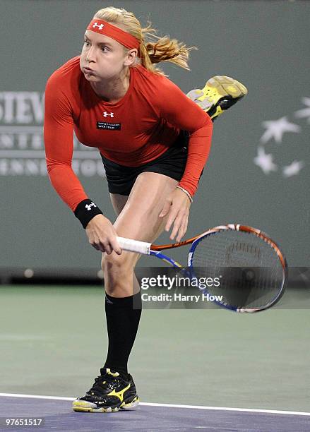 Bethanie Mattek-Sands of the United States serves in her match against Yaroslava Shvedova of Kazakhstan during the BNP Paribas Open at the Indian...