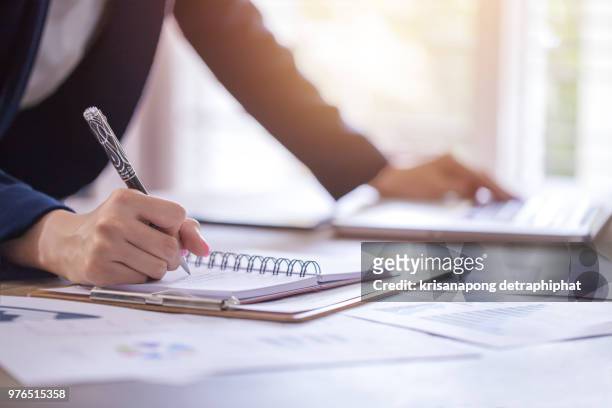 accounting,count,business women,laptop - audit stock pictures, royalty-free photos & images