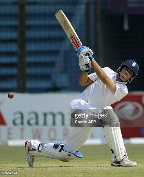 England cricket team captain Alastair Cook plays a shot during the first day of play in the first Test match between Bangladesh and England at The...