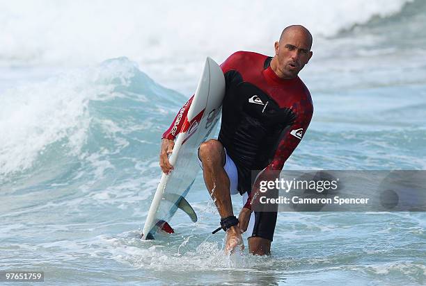 Kelly Slater of the United States walks out of the water following an aerial expression session during day one of Surfsho at Bondi Beach on March 12,...