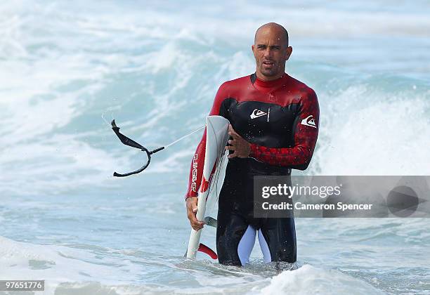 Kelly Slater of the United States walks out of the water following an aerial expression session during day one of Surfsho at Bondi Beach on March 12,...