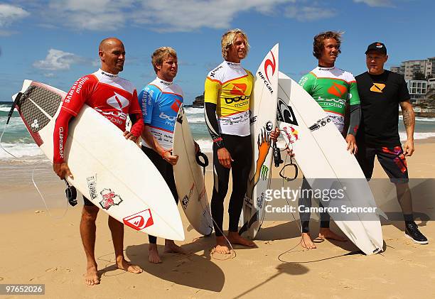 Kelly Slater of the United States, Taj Burrow and Owen Wright of Australia, Jordy Smith of South Africa and boxer Danny Green of Australia pose prior...